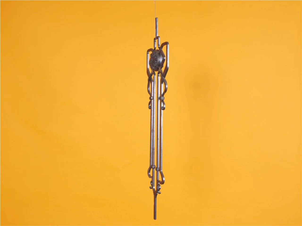 Wyrób kuty: Kuta tralka balustradowa ozdobna z rozetą 25 cm 950 mm