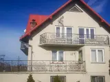 Wyrób kuty: Klasyczna Balustrada Kuta Zewnętrzna z Ornamentyką Rococo