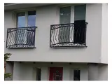Wyrób kuty: Kuta Balustrada Fasadowa z Ornamentyką Klasyczną