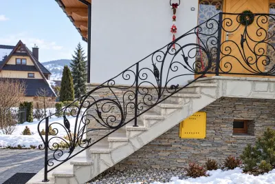 Kuta balustrada schodowa zdobiona ornamentem florystycznym, model sx50 — odtworzone ujęcie oryginalne. Wizualizacja AI.