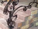 Wyrób kuty: Kuta Balustrada Zewnętrzna w Stylu Neobarokowym z Ornamentem Floralnym