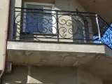 Wyrób kuty: Kuta Balustrada Zewnętrzna z Ornamentyką Klasyczną