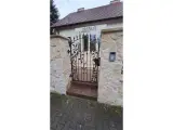 Wyrób kuty: Kuta Brama Przesuwna z Motywem Florystycznym