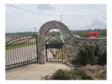 Wyrób kuty: Kuta Brama Wjazdowa Uchylna z Spiralnymi Ornamentami