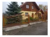 Wyrób kuty: Kute Ogrodzenie Posesyjne z Ornamentyką Winorośli