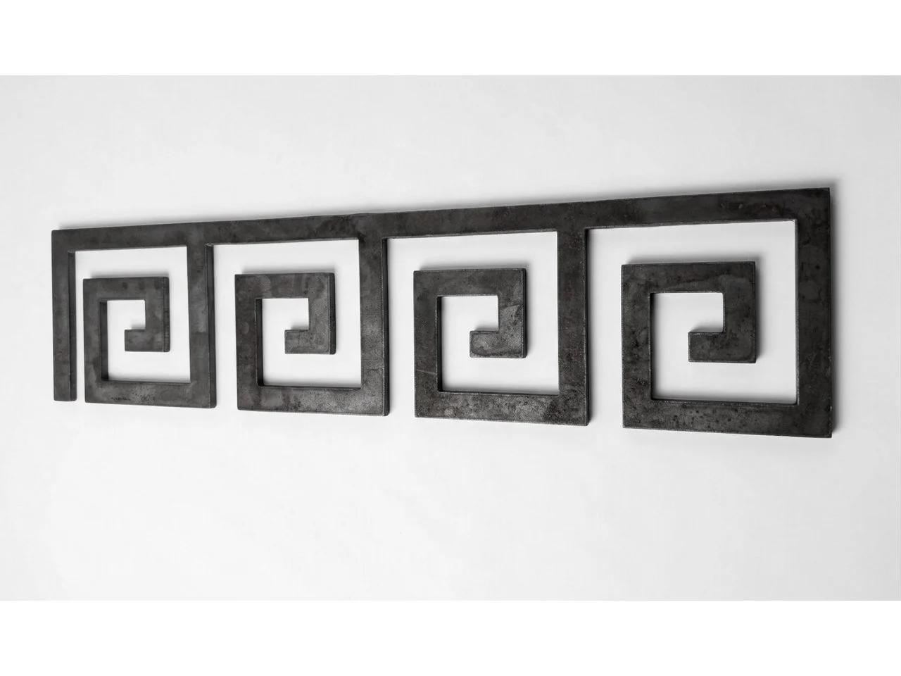 Wyrób kuty: Stalowa rozeta ozdobna taśma z motywem greckim do balustrad 1200x120 mm
